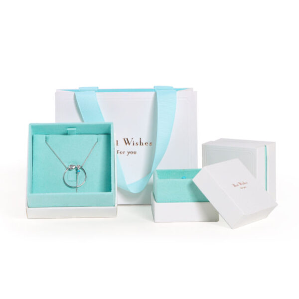 Custom Two-Piece Rigid Gift Box with Handbag Handles – Jewelry Packaging Wholesale Custom two-piece rigid gift box with integrated handbag handles, featuring premium branding and custom foam insert