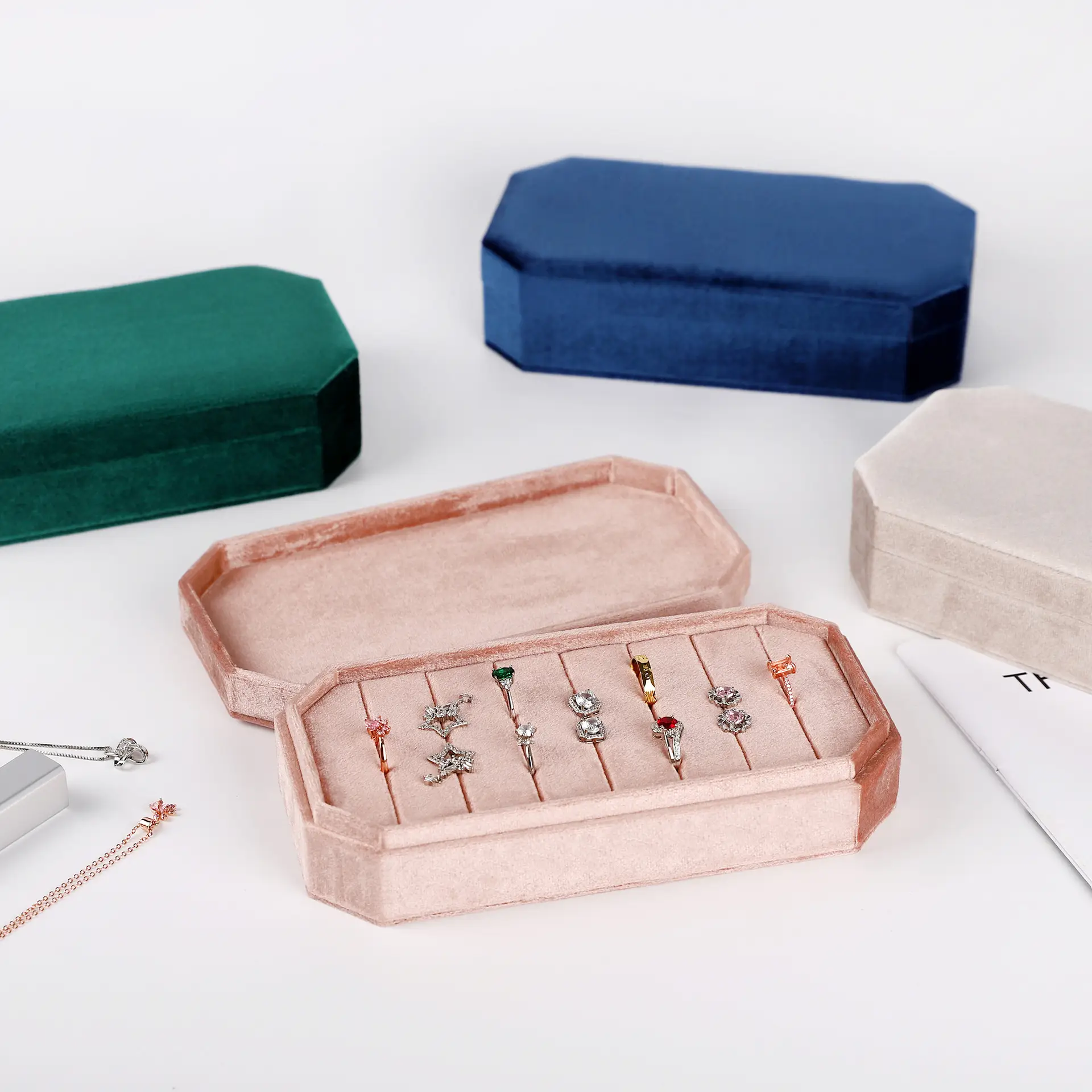 Premium flip-cover velvet ring display box with multiple compartments for jewelry storage and retail packaging
