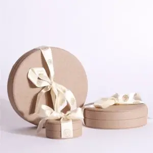 Luxury round custom jewelry set boxes with logo branding, available in multiple materials and finishes