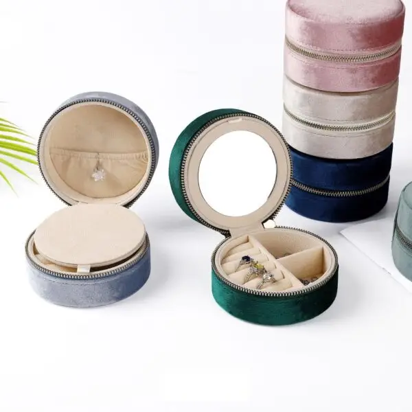 Custom round double-layer travel jewelry case with velvet lining and embroidered branding for retail and bridesmaid gift packaging
