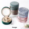 Custom round double-layer travel jewelry case with velvet lining and embroidered branding for retail and bridesmaid gift packaging