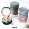 Custom round double-layer travel jewelry case with velvet lining and embroidered branding for retail and bridesmaid gift packaging