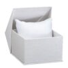 Custom silk-brushed paper pillow boxes with gold foil logo branding and velvet interior insert for jewelry display