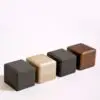 Luxury custom square jewelry box with Italianate design, embossed logo, and protective velvet interior