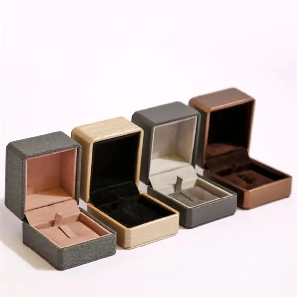 Luxury custom square jewelry box with Italianate design, embossed logo, and protective velvet interior