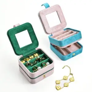 Custom double-layer velvet travel jewelry box with color-block compartments and branded logo