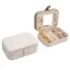 Custom personalized travel jewelry case with velvet compartments and logo embossing