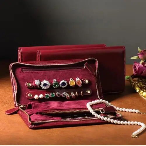 Burgundy PU leather travel jewelry case with customizable compartments, magnetic closure, and logo branding for wholesale