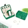 Wholesale custom velvet and suede travel jewelry cases with embossed branding and customizable interior compartments