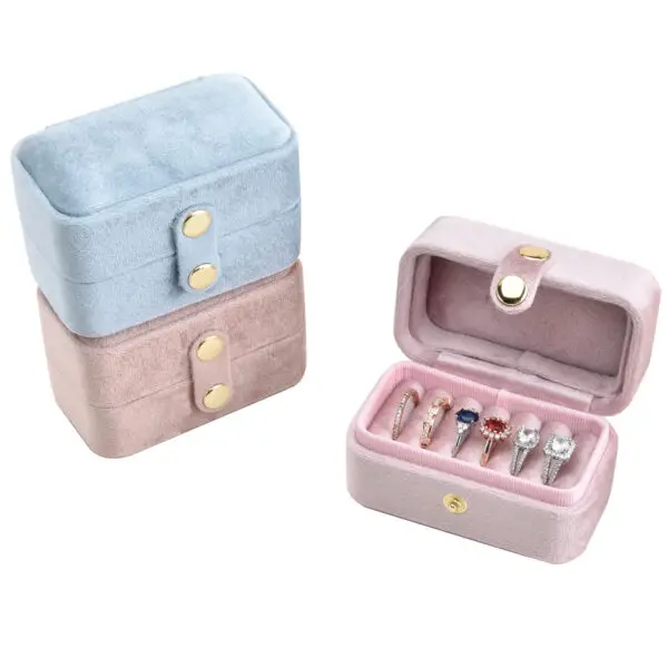 Luxury velvet travel ring storage box with custom logo branding and compartmentalized design