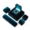 Premium blue velour earring and ring boxes with custom insert padding and logo branding