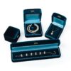 Premium blue velour earring and ring boxes with custom insert padding and logo branding