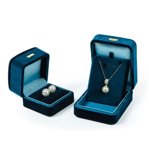 Premium blue velour earring and ring boxes with custom insert padding and logo branding