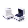 Custom white velvet earring box with branded logo, foam insert, and luxury unboxing packaging for jewelry retailers