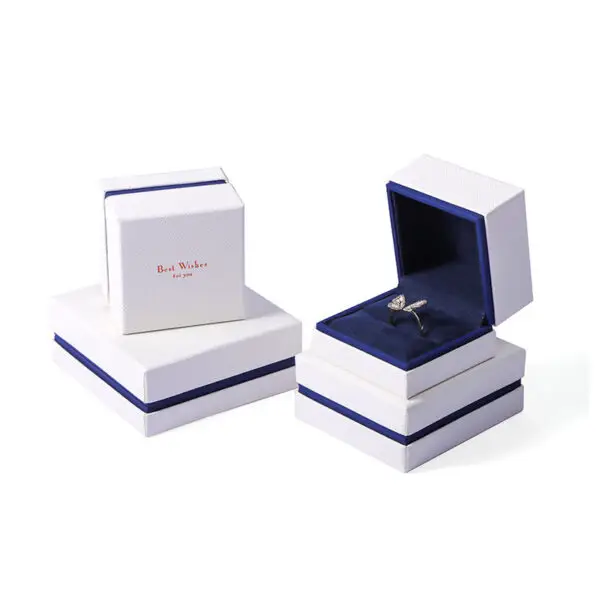 Custom white velvet earring box with branded logo, foam insert, and luxury unboxing packaging for jewelry retailers