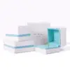 Custom white velvet earring box with branded logo, foam insert, and luxury unboxing packaging for jewelry retailers