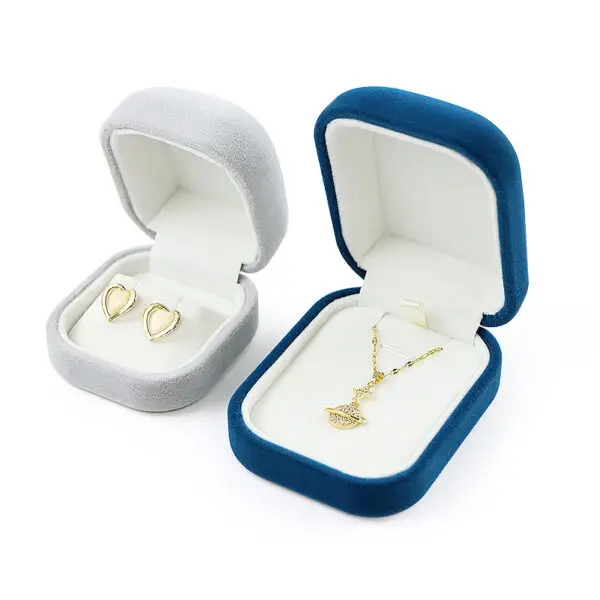Premium custom velvet earring box with personalized gold logo branding and foam insert