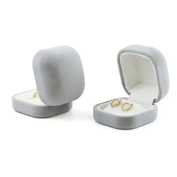 Premium custom velvet earring box with personalized gold logo branding and foam insert