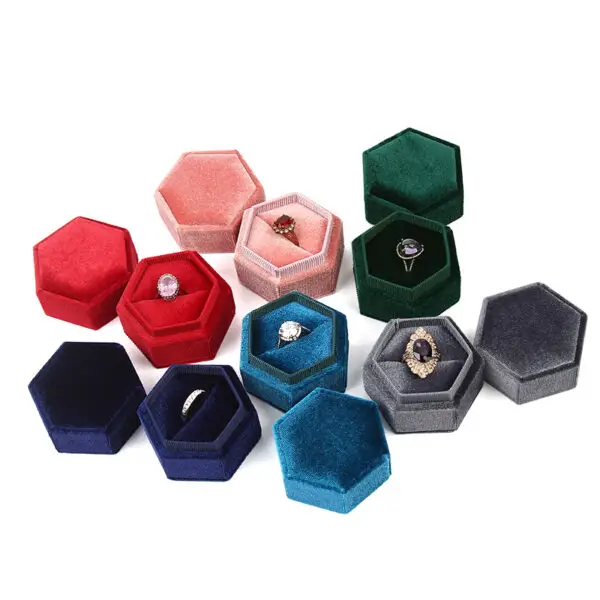 Elegant custom velvet hexagon ring box with dual ring compartments and embossed logo branding