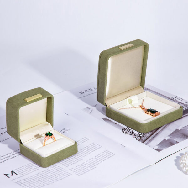Premium custom velvet jewelry box packaging with soft-touch finish and branded interior foam inserts