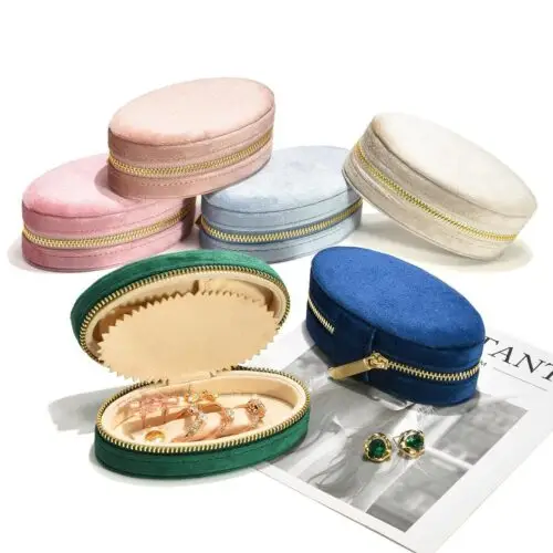 Custom velvet mini oval travel jewelry organizer box with soft interior compartments for rings, earrings, and jewelry storage