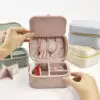 Custom velvet travel jewelry case with integrated mirror and customizable compartments for retail packaging