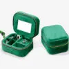 Custom velvet travel jewelry case with integrated mirror and customizable compartments for retail packaging