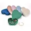 Custom heart-shaped velvet travel jewelry box with logo embossing, removable foam insert, bulk jewelry packaging