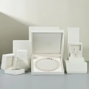 White velvet earring and ring jewelry box with custom foam insert and lid closure – luxury packaging for jewelry brands