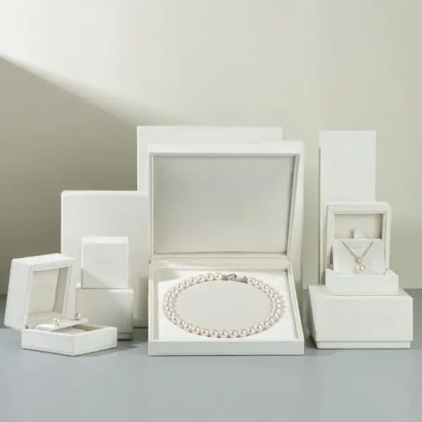 White velvet earring and ring jewelry box with custom foam insert and lid closure – luxury packaging for jewelry brands