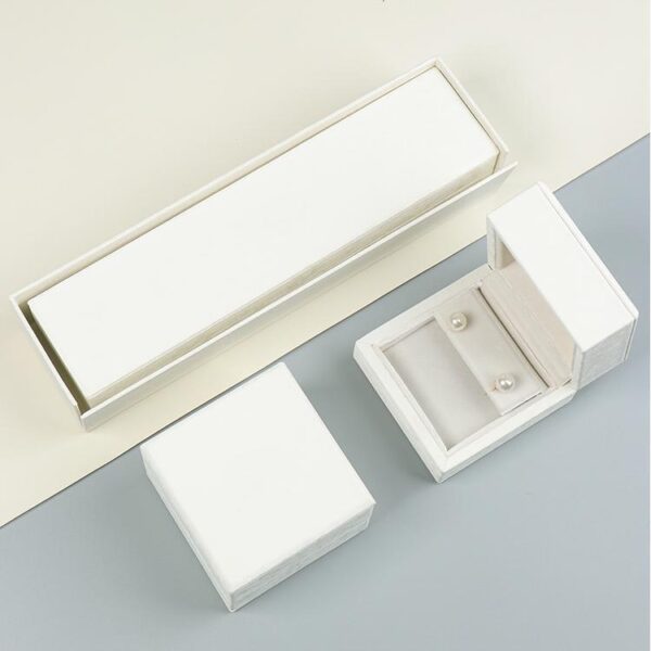 White velvet earring and ring jewelry box with custom foam insert and lid closure – luxury packaging for jewelry brands