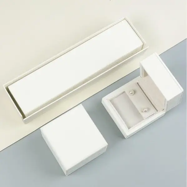 White velvet earring and ring jewelry box with custom foam insert and lid closure – luxury packaging for jewelry brands