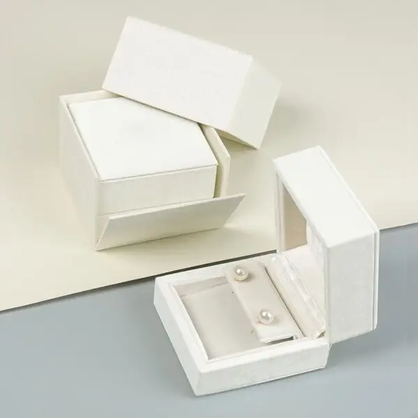 White velvet earring and ring jewelry box with custom foam insert and lid closure – luxury packaging for jewelry brands