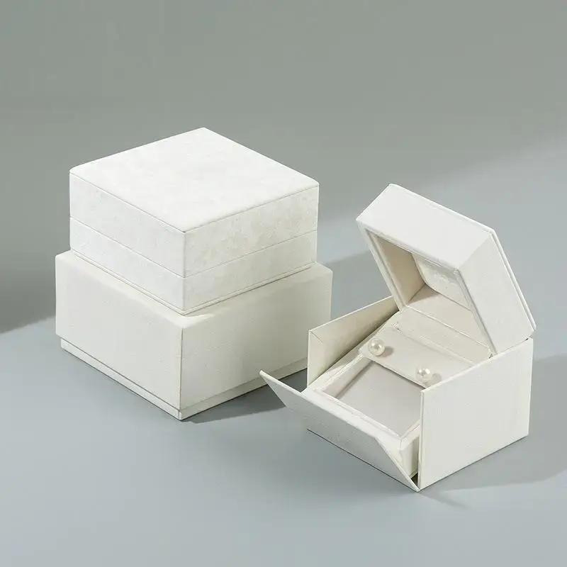 White velvet earring and ring jewelry box with custom foam insert and lid closure – luxury packaging for jewelry brands