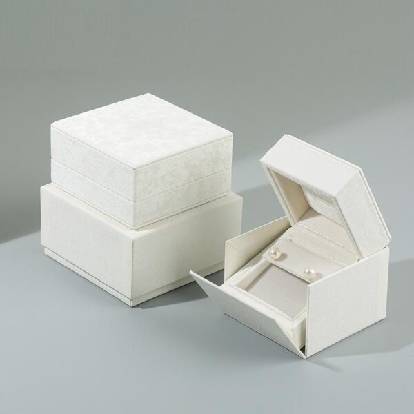 White velvet earring and ring jewelry box with custom foam insert and lid closure – luxury packaging for jewelry brands