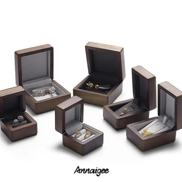 Custom wooden jewelry boxes with velvet lining and embossed logo branding for jewelry retailers