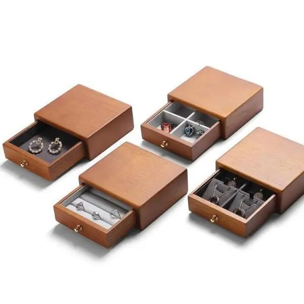 Custom wooden jewelry boxes with velvet lining and embossed logo branding for jewelry retailers
