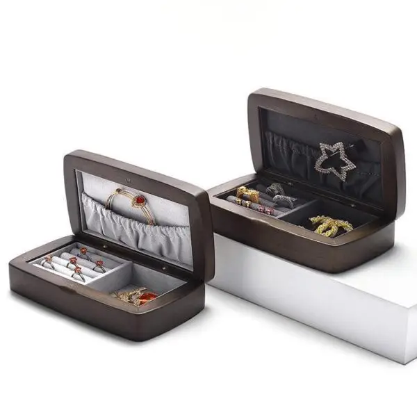Custom wooden jewelry boxes with velvet lining and embossed logo branding for jewelry retailers