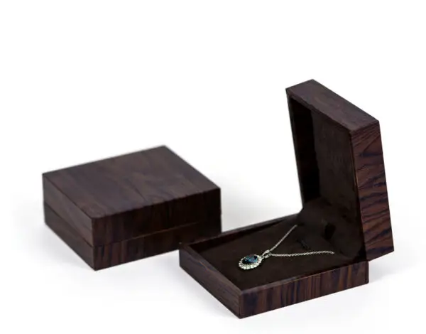 Custom wooden ring box with velvet insert, logo branding, and wholesale jewelry packaging