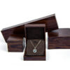 Premium custom wooden ring box with velvet insert and personalized logo branding for jewelry retail packaging.