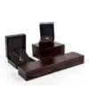 Premium custom wooden ring box with velvet insert and personalized logo branding for jewelry retail packaging.