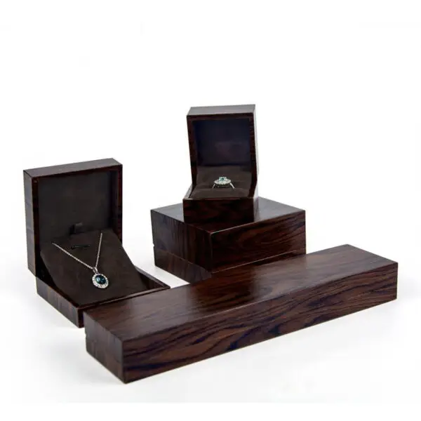 Premium custom wooden ring box with velvet insert and personalized logo branding for jewelry retail packaging.