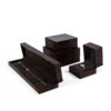 Premium custom wooden ring box with velvet insert and personalized logo branding for jewelry retail packaging.