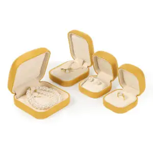 Custom yellow velvet earring box with round corners, adjustable insert, for wholesale jewelry packaging
