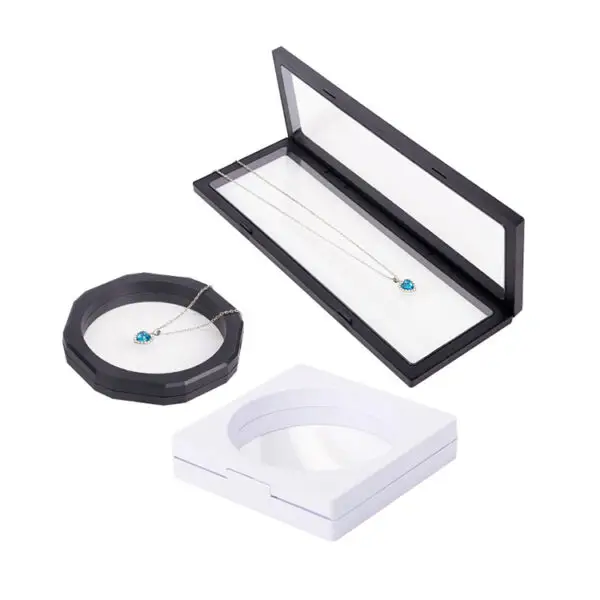Custom floating jewelry display case with suspension insert design, closed view showing branded exterior packaging