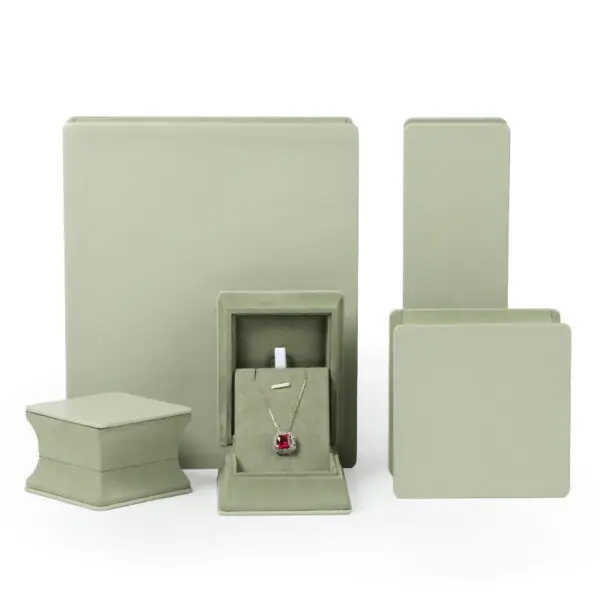 Custom Premium Leather Ring Jewelry Boxes with Cinched Waist Design Custom leather ring jewelry boxes with waist-cinch closure, showing interior compartments and custom branding options