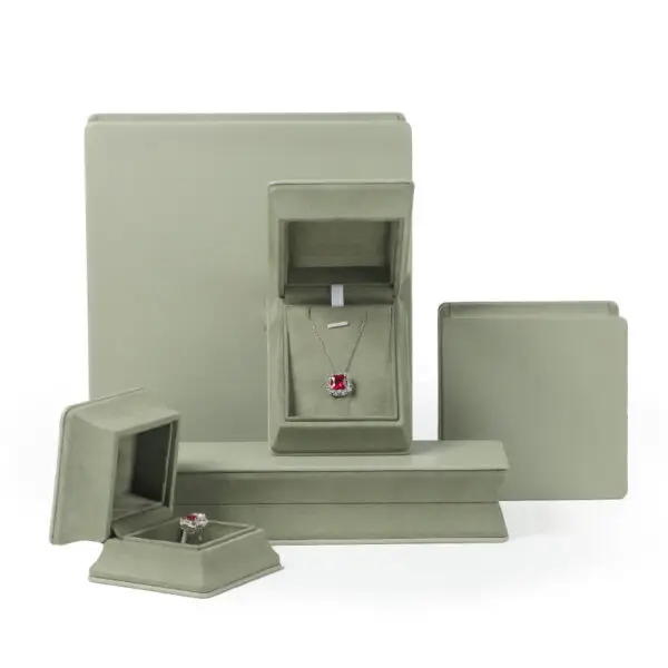 Custom Premium Leather Ring Jewelry Boxes with Cinched Waist Design Custom leather ring jewelry boxes with waist-cinch closure, showing interior compartments and custom branding options