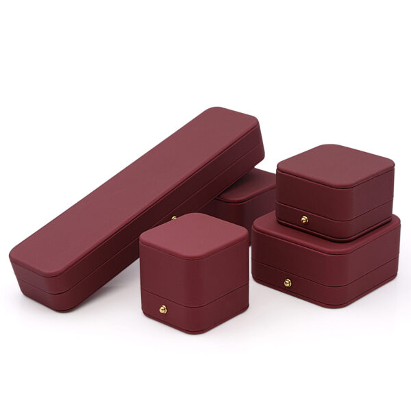 Luxury leather necklace and pendant jewelry boxes with custom embossing and velvet interior padding for premium packaging