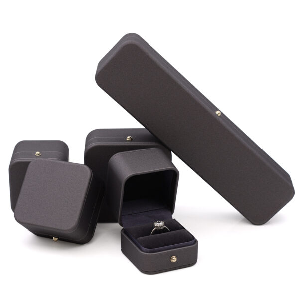 Luxury leather necklace and pendant jewelry boxes with custom embossing and velvet interior padding for premium packaging