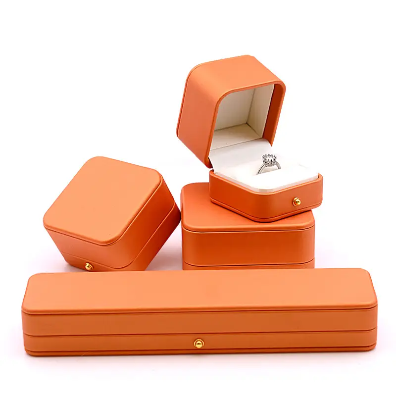 Luxury leather necklace and pendant jewelry boxes with custom embossing and velvet interior padding for premium packaging